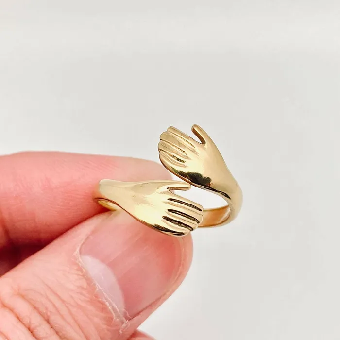 Hands Cuddling Gold Plated Stainless Steel Ring Mio Queena Rings