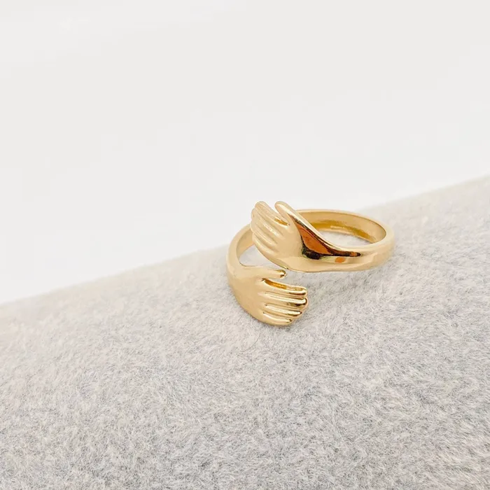 Hands Cuddling Gold Plated Stainless Steel Ring Mio Queena Rings