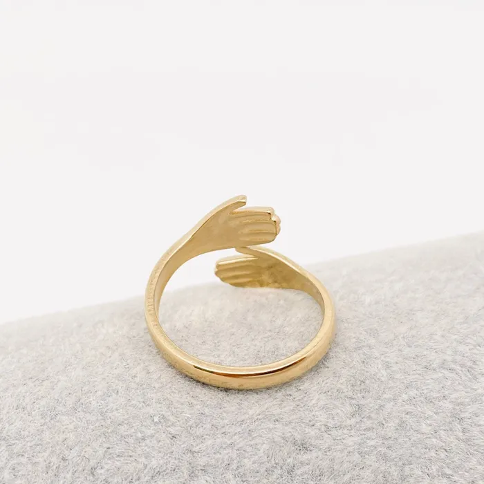 Hands Cuddling Gold Plated Stainless Steel Ring Mio Queena Rings