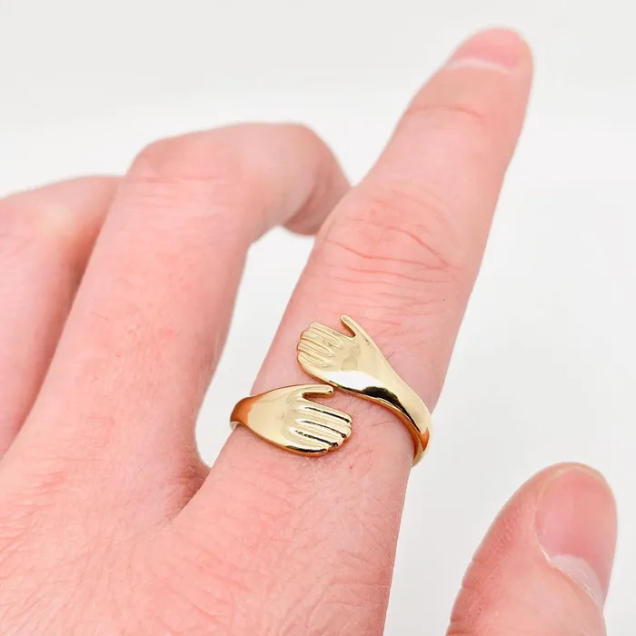Hands Cuddling Gold Plated Stainless Steel Ring Mio Queena Rings