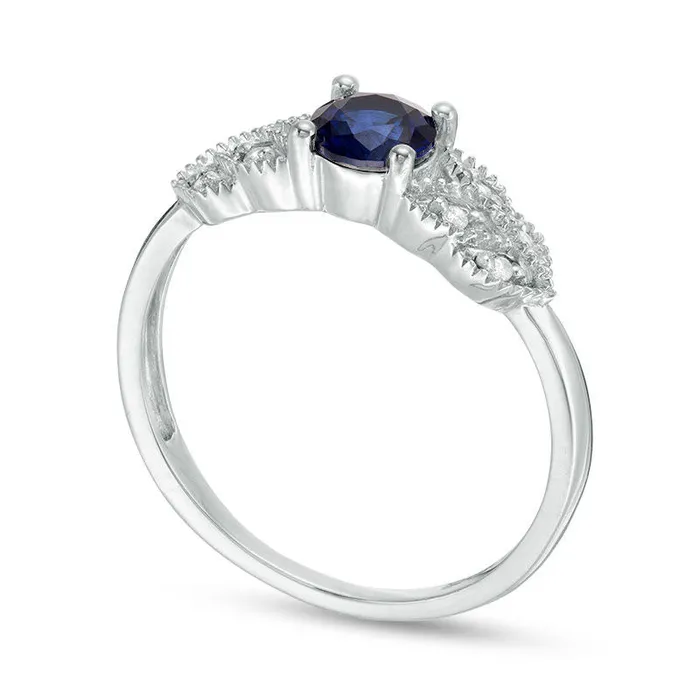 Goldia 50mm LabCreated Blue Sapphire and 005 CT TW Diamond LeafSides Antique VintageStyle Promise Ring in Solid 10K White Gold Rings Goldia 50mm LabCreated Blue Sapphire and 005 CT TW Diamond LeafSides Antique VintageStyle Promise Ring in Solid 10K White Gold Rings