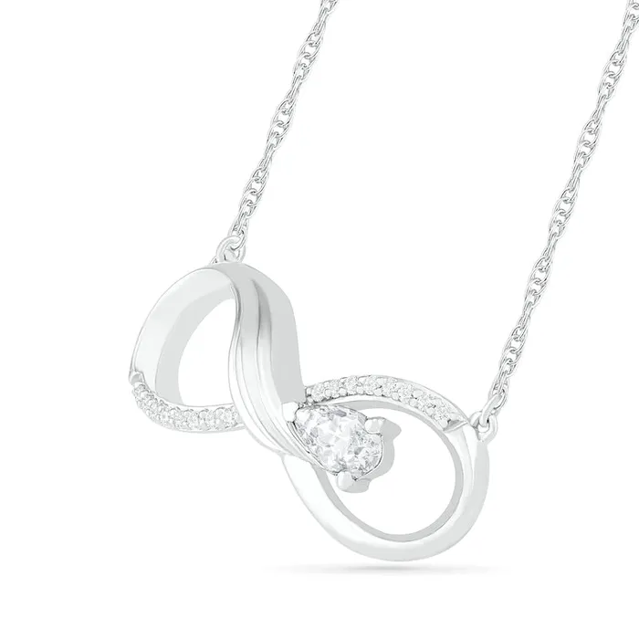 Goldia PearShaped LabCreated White Sapphire and 005 CT TW Diamond Winged Infinity Necklace in Sterling Silver Necklaces Goldia PearShaped LabCreated White Sapphire and 005 CT TW Diamond Winged Infinity Necklace in Sterling Silver Necklaces