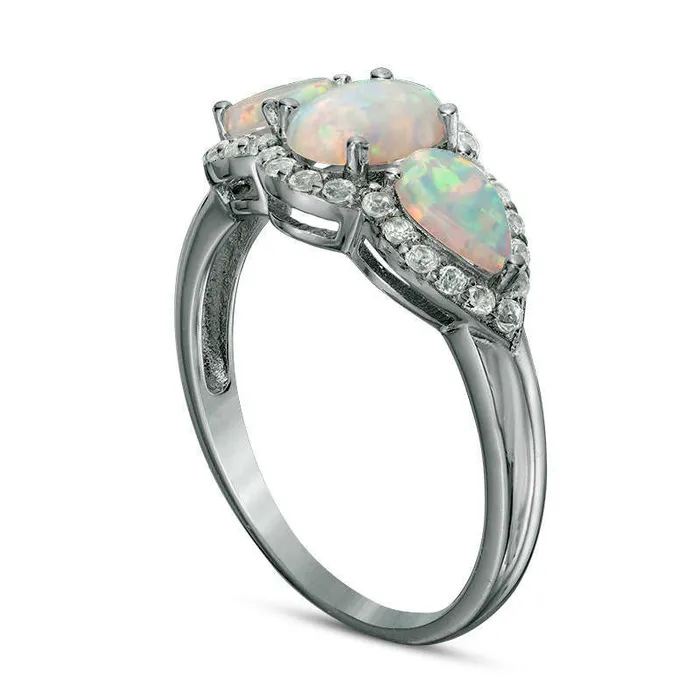 Goldia Rings Oval and PearShaped LabCreated Opal with White Topaz Frame Three Stone Ring in Sterling Silver Goldia Rings Oval and PearShaped LabCreated Opal with White Topaz Frame Three Stone Ring in Sterling Silver