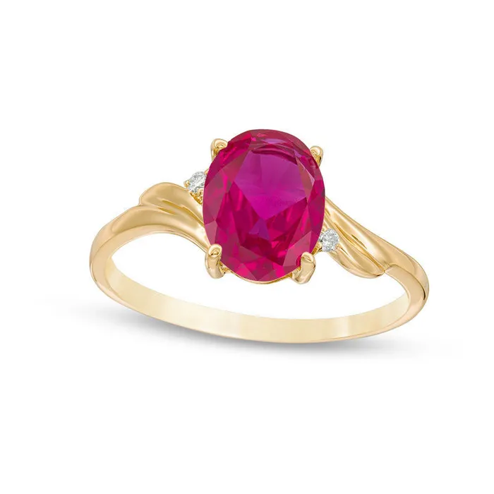 Goldia Rings Oval LabCreated Ruby and Diamond Accent Bypass Swirl Shank Ring in Solid 10K Yellow Gold Goldia Rings Oval LabCreated Ruby and Diamond Accent Bypass Swirl Shank Ring in Solid 10K Yellow Gold